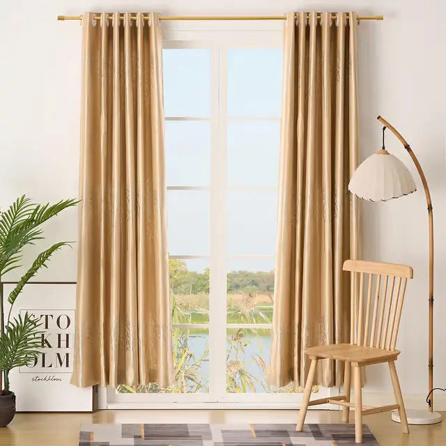 Gold extendable curtain pole 76cm to 200cm fitted above window