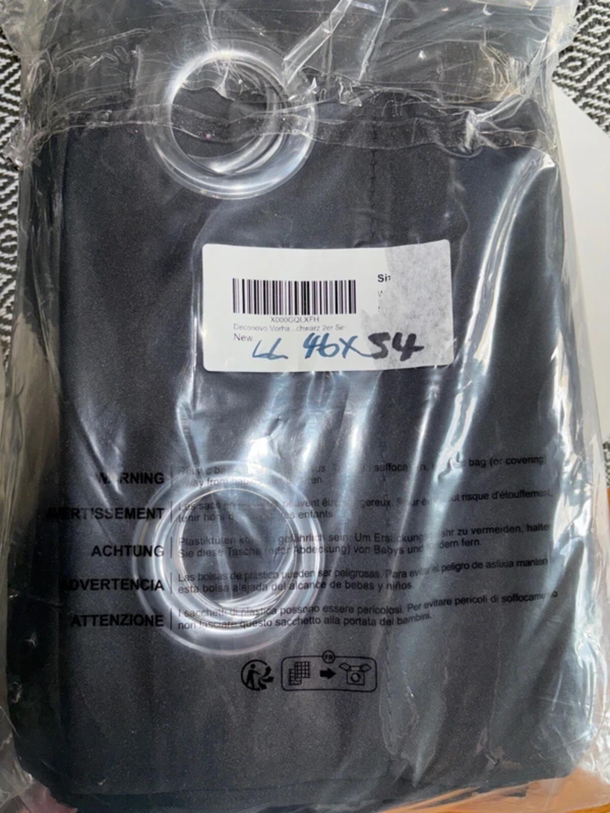 Pair of blackout eyelet curtains 46w x 54l